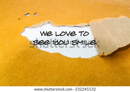 Text we love to see you smile on the brown envelope