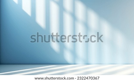 A light background with captivating shadows on the wall, serving as an ideal template or backdrop for product presentations Royalty-Free Stock Photo #2322470367
