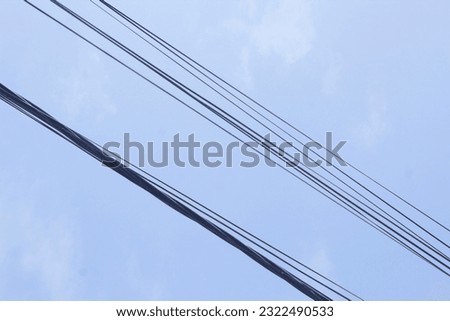 Electrical Wires With Blue Sky Background