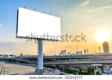 Blank billboard at twilight for advertisement. Royalty-Free Stock Photo #232252177