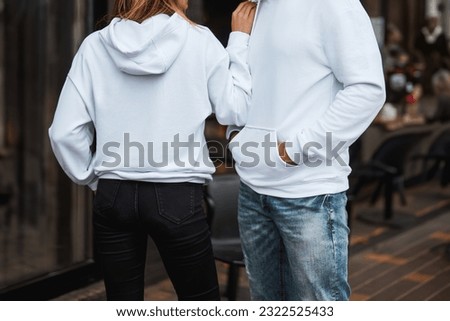 Versatile Clothing Brand Showcase. Mockup Templates for Hoodies and Casual Sportswear Featuring a Stylish model Wearing Logo-Free Designs Basic clothing brand mockup. Design template for a hoodie Royalty-Free Stock Photo #2322525433