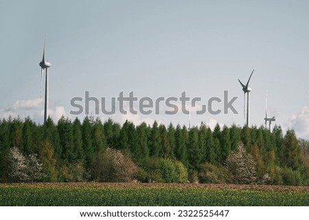 Wind Turbines against the sky. Wind turbines in Europe. Concept of sustainable and green future