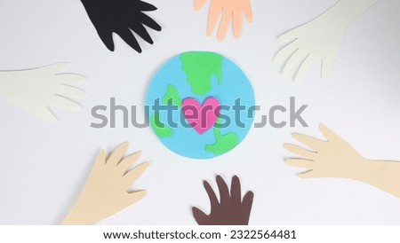 African american people together. Earth day postcard close up. Stop motion paper animation. Show love gesture. Racial unity concept. Black antiracism sign. Pink heart beat. Eco art card. Green globe.