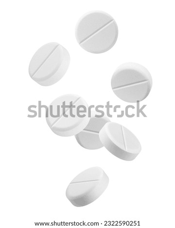 Falling Pills isolated on white background, clipping path, full depth of field Royalty-Free Stock Photo #2322590251