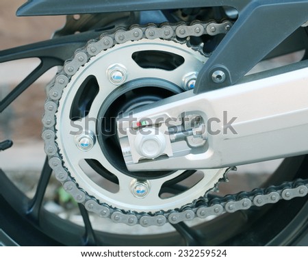 motorcycle wheel and drive-chain 