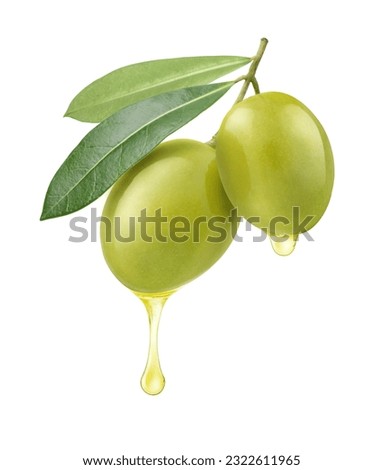 Olive oil dripping from fruits isolated on white background. Royalty-Free Stock Photo #2322611965