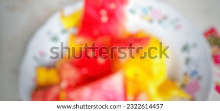 Abstract background defocused landscape of watermelon and mango fruit in plate
