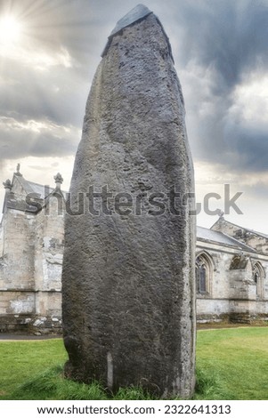 The monolith at Rudston in East Yorkshire Royalty-Free Stock Photo #2322641313
