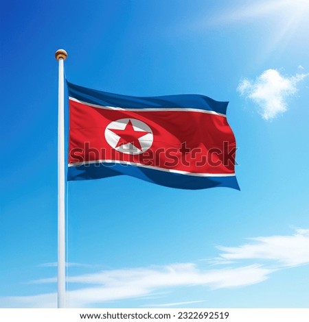 Waving flag of North Korea on flagpole with sky background. Template for independence day
