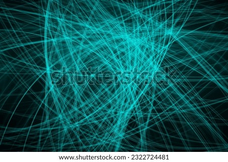 An abstract background photograph of neon teal lines in a chaotic pattern Royalty-Free Stock Photo #2322724481