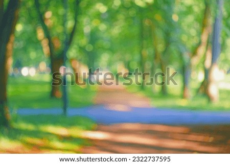 City lawn view. Green nature in spring eco garden. Summer abstract blur background. Urban trees leaves Light blurry out focus bokeh. Soft plant. Sunny sky foliage park grass Bright color sun day image Royalty-Free Stock Photo #2322737595