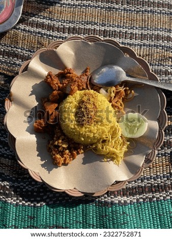 Nasi Kuning most one traditional indonesia food Royalty-Free Stock Photo #2322752871