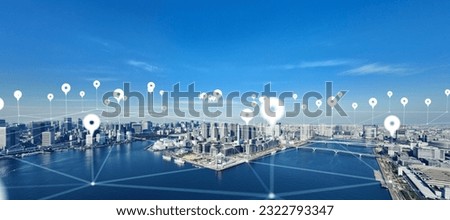 Modern cityscape and location information concept. GPS. Global Positioning System. Navigation map. Composite visual with a drone point of view. Mixed media. Royalty-Free Stock Photo #2322793347