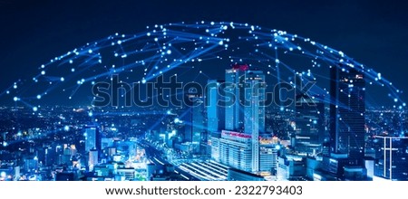 Modern cityscape and communication network concept. Telecommunication. IoT (Internet of Things). 5G. Smart city. Digital transformation. Composite visual with a drone point of view. Mixed media. Royalty-Free Stock Photo #2322793403