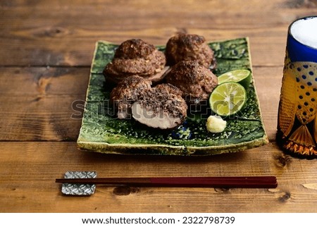 Shiitake mushroom stuffed with meat