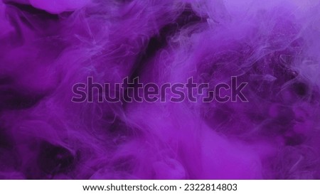 Color smoke texture. Paint water. Ethereal vapor. Bright neon purple pigment fume mist cloud wave on dark black abstract art background.