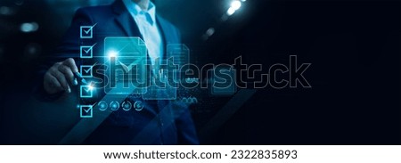 Businessman check electronic documents on digital documents and  checklist approve, online evaluation of business on virtual interface, Communication technology concept. Royalty-Free Stock Photo #2322835893