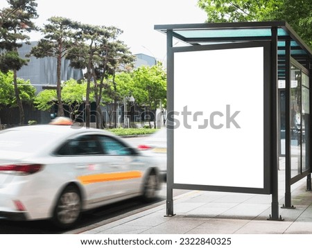 Blank white Mock up Media Advertisement at bus stop City street