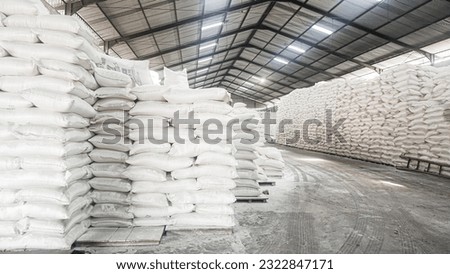 stacked sacks of flour in warehouse waiting for transportation