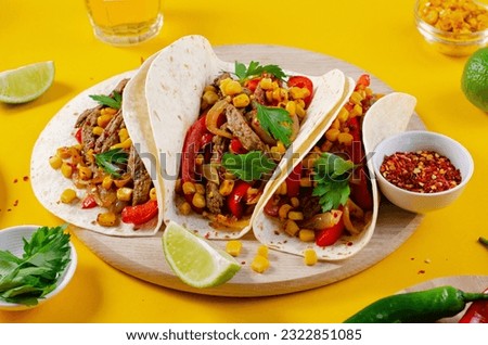 Mexican Tacos with Beef and Vegetables, Tacos al Pastor on Bright Yellow Background