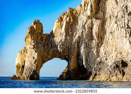 Photo of the incredible arch of Cape Saint Luke, which is where the Sea of Cortez meets the Pacific Ocean, in the state of Baja California Sur, Mexico. Arch concept. Royalty-Free Stock Photo #2322859855