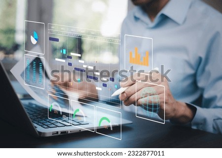 Working Data Analytics and Data Management Systems and Metrics connected to corporate strategy database for Finance, Intelligence,  Business Analytics with Key Performance Indicators, social network   Royalty-Free Stock Photo #2322877011