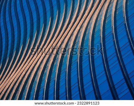 Glass wall curve Architecture details Modern building Exterior  Royalty-Free Stock Photo #2322891123