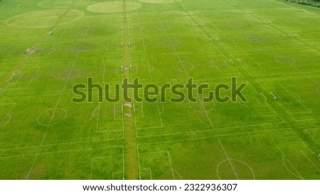 A lot of  empty football pitches or soccer pitches seen from the sky with a drone view in Hackney Marshes Royalty-Free Stock Photo #2322936307