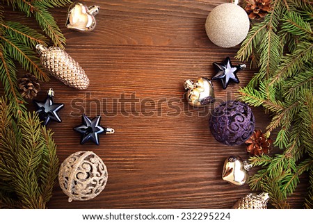 Christmas Tree and decorations on wooden background space for lettering