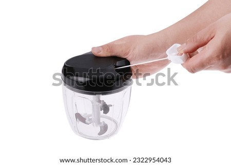 Manual food chopper. vegetable cutter. hand chopper. mini chopper. non electric chopper.  cutter one piece black and transparent. Royalty-Free Stock Photo #2322954043