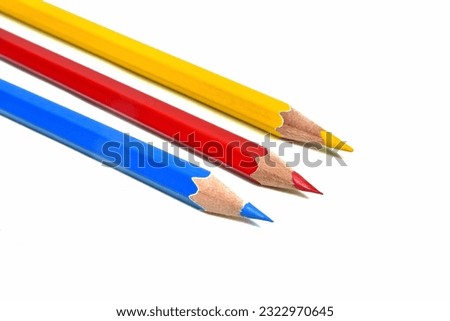 Pencils. Colors. Various colors. Isolated. Lined up. On a white background. Top view photograph