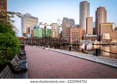 Boston Harbor and Financial District in Boston, Massachusetts, USA at sunrise.