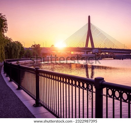 Boston in Massachusetts, USA at sunrise with the famous architecture of the Zakim Bridge.