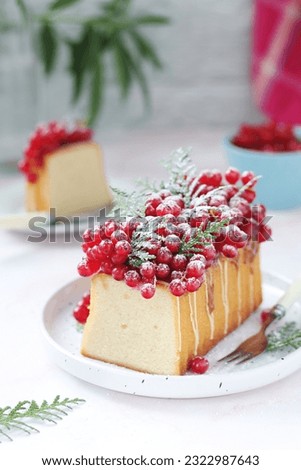 A biscuit decorated with red currant Royalty-Free Stock Photo #2322987643