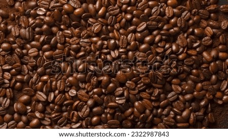 A very beautiful picture has been taken by combining many coffee beans. Coffee beans are placed on the table.