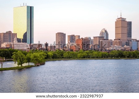 The Backbay neighborhood in Boston, Massachusetts, USA at sunrise with the Charles River and its iconic skyscrapers.