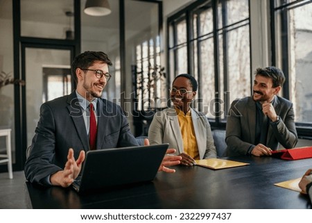 Group of business persons in a business meeting. Corporate business team on meeting in the office. Royalty-Free Stock Photo #2322997437