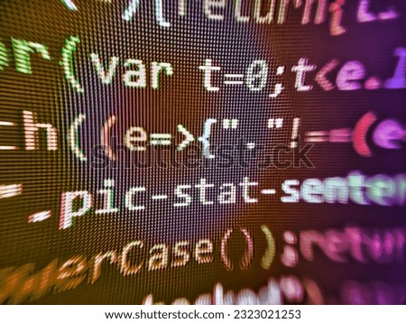 Program code PHP HTML CSS of site. Binary digits code editing. Shallow Depth of Field effect. Black background with colored lines of code