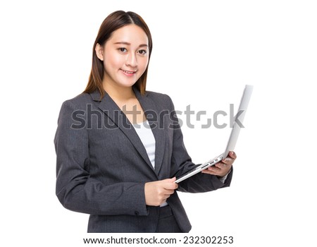 Businesswoman use of notebook
