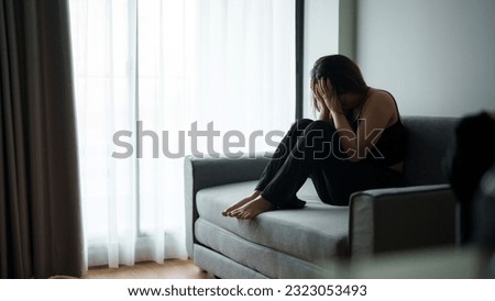 Mental health problem, Sad asian female anxiety depressed lonely in his home.
 Royalty-Free Stock Photo #2323053493