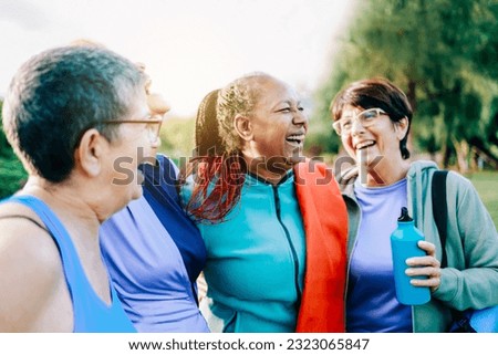 Senior sport people having fun after exercising in yoga class outdoor at park city - Fitness joyful Elderly lifestyle Royalty-Free Stock Photo #2323065847
