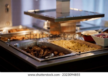 Buffet tables in a restaurant. Ideas for serving and wedding. Picture for a menu or confectionery catalog, restaurant, candy bar