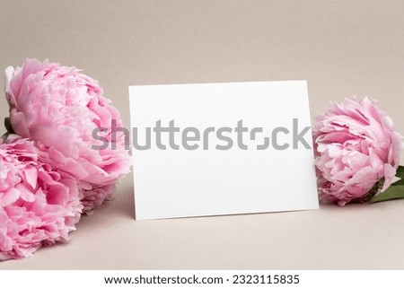 Invitation or greeting card mockup with flowers, blank card mock up with copy space