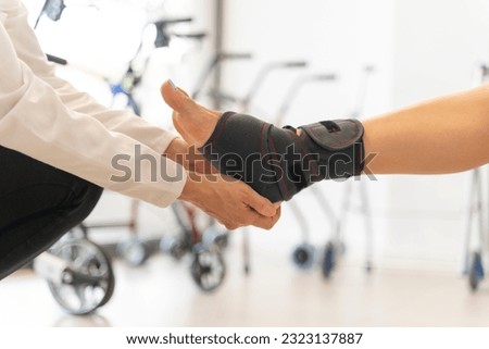 Close-up of a woman's foot with a sports ankle brace Royalty-Free Stock Photo #2323137887