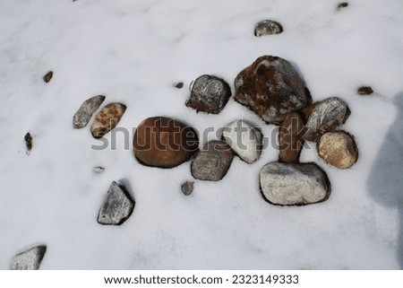 rock in the ice. Mountain rock picture. 