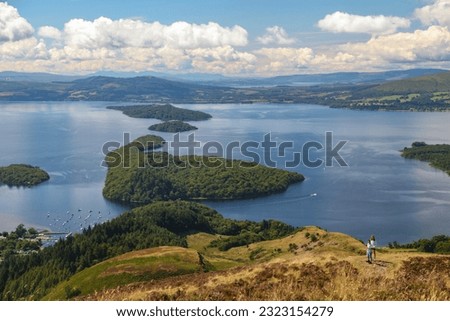 Conic Hill is a sharp little summit rising above Balmaha. Right on the Highland Boundary Fault, this short hillwalk offers truly fantastic views over Loch Lomond Royalty-Free Stock Photo #2323154279