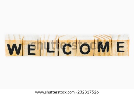 Welcome words made out of English alphabet pieces on white background