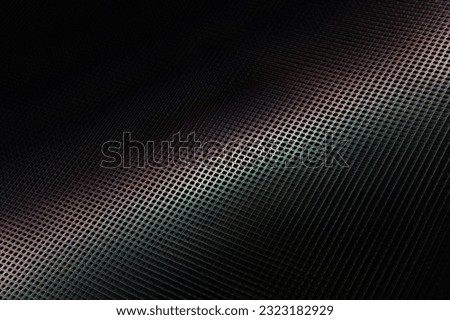 Dark background. A streak of light on a dark surface. Texture. Textured background. Wallpaper.