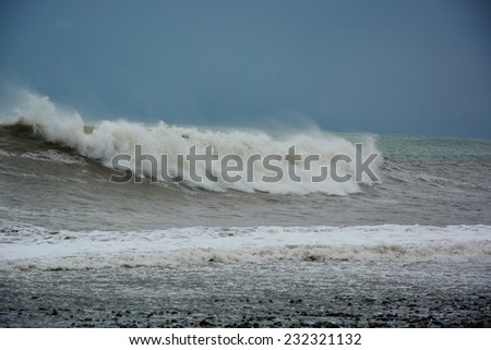 Stormy sea waves breaking near the coast