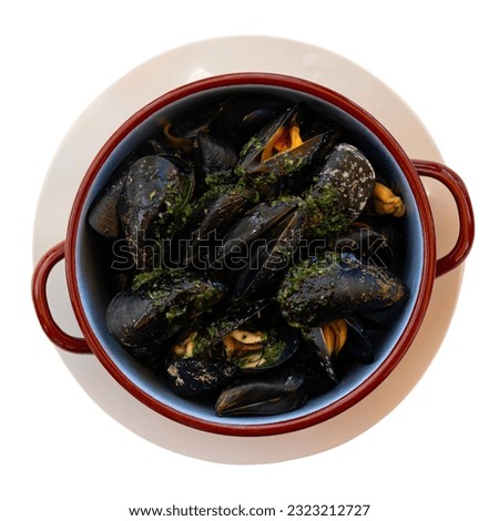 Picture of steamed tasty mussels served on pan with lemon, tapas of spanish cuisine. Isolated over white background